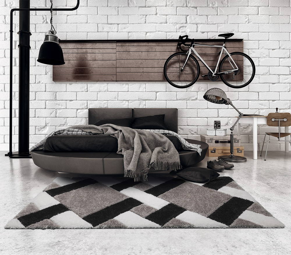 La alfombra de tipo 'grid grey' contribuye a la imagen perfecta de la habitación.