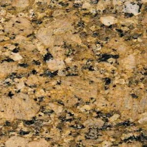 Primer plano del granito natural Giallo Veneziano, con una mezcla de tonos dorados, beige, marrón y pequeñas inclusiones minerales oscuras.